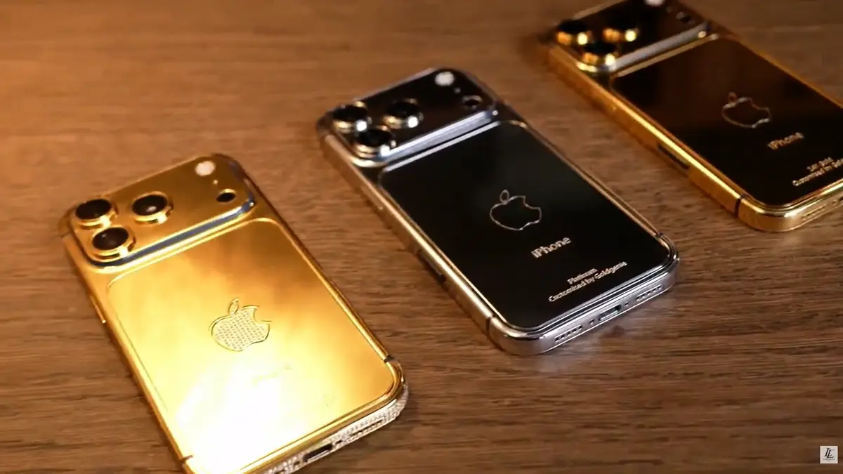 LERONZA™ Gold iPhone being carefully maintained using a premium microfiber cloth.